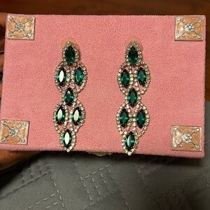 Emerald and silver crystal earring. 3.5 inches long. Used once on stage.